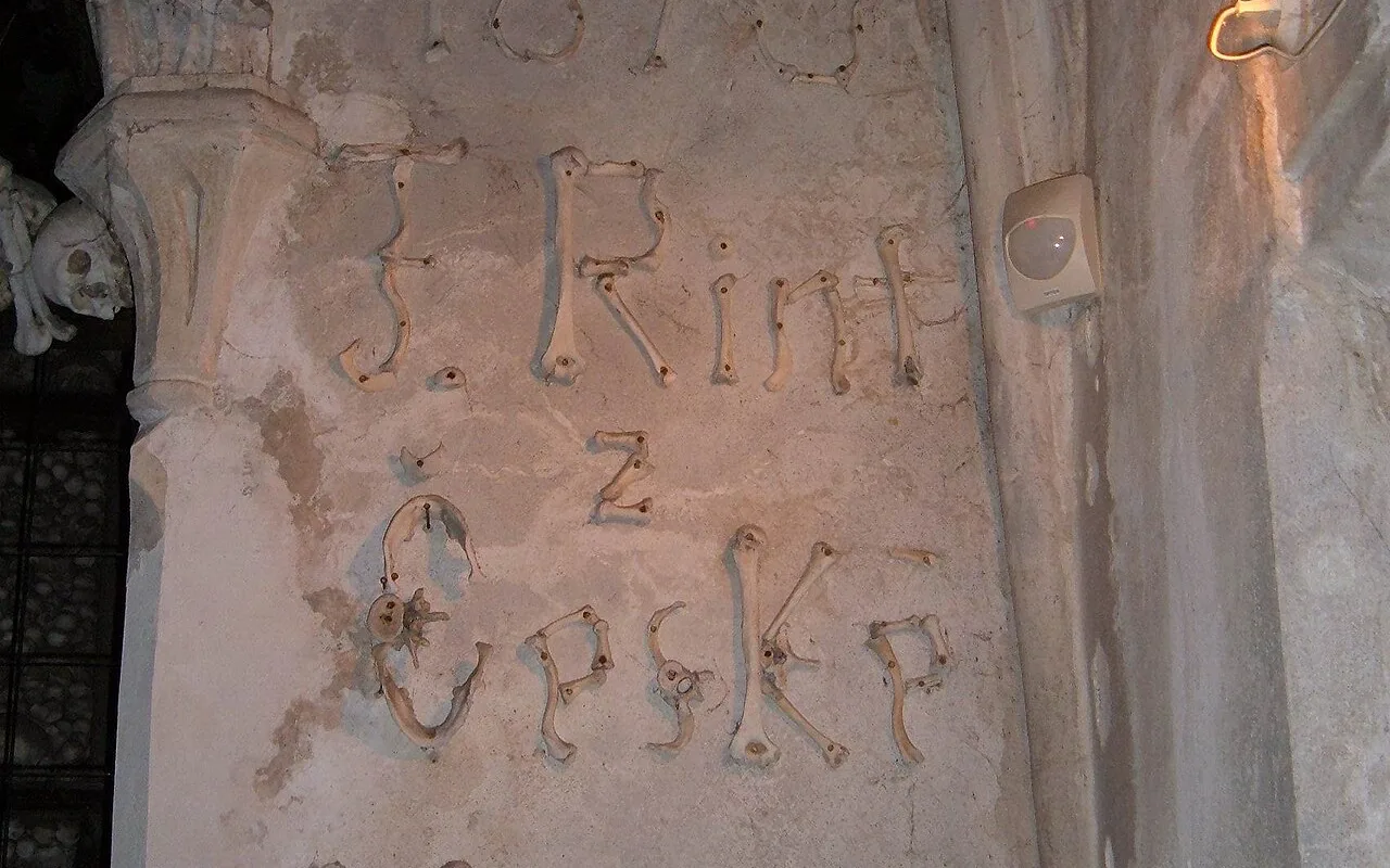 František Rint's name spelled out in bone on the wall of the Sedlec Ossuary